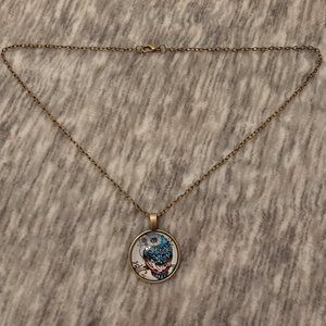 EUC Owl motif pendant 19" in length